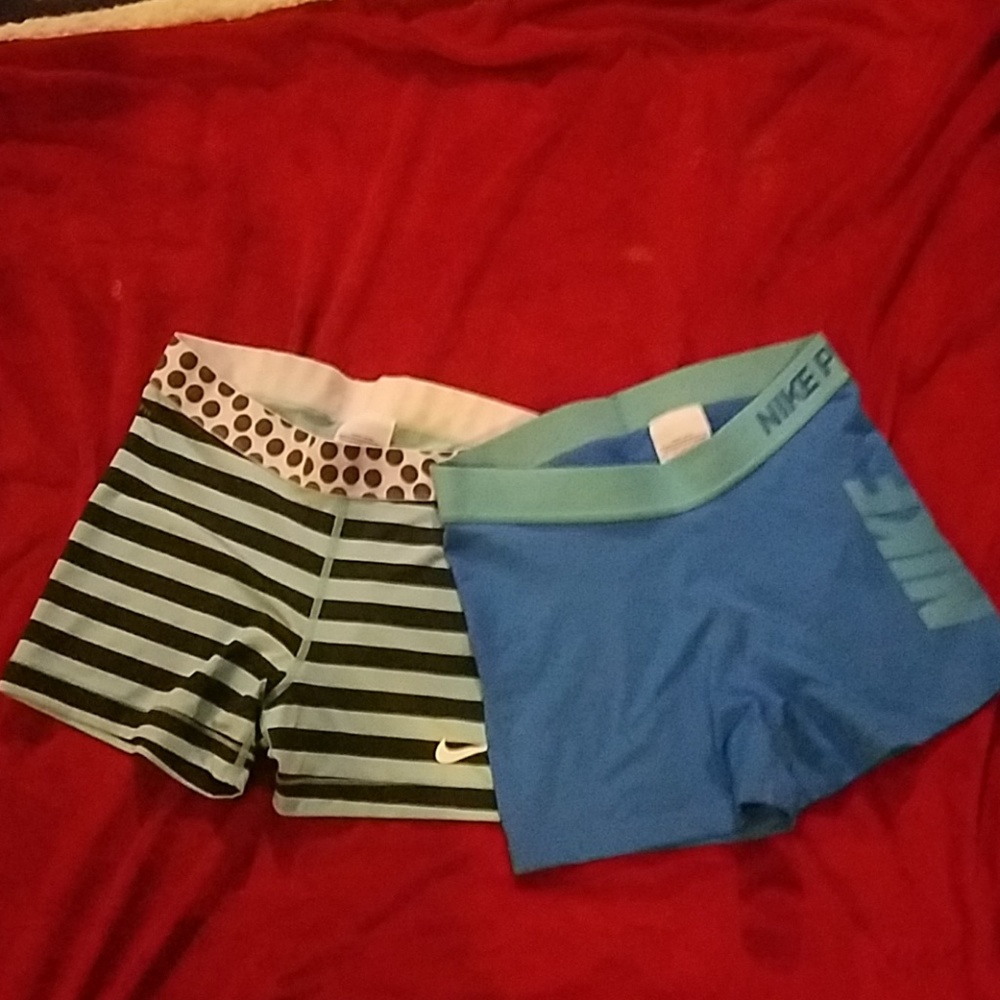 Two pair of Nike Pro